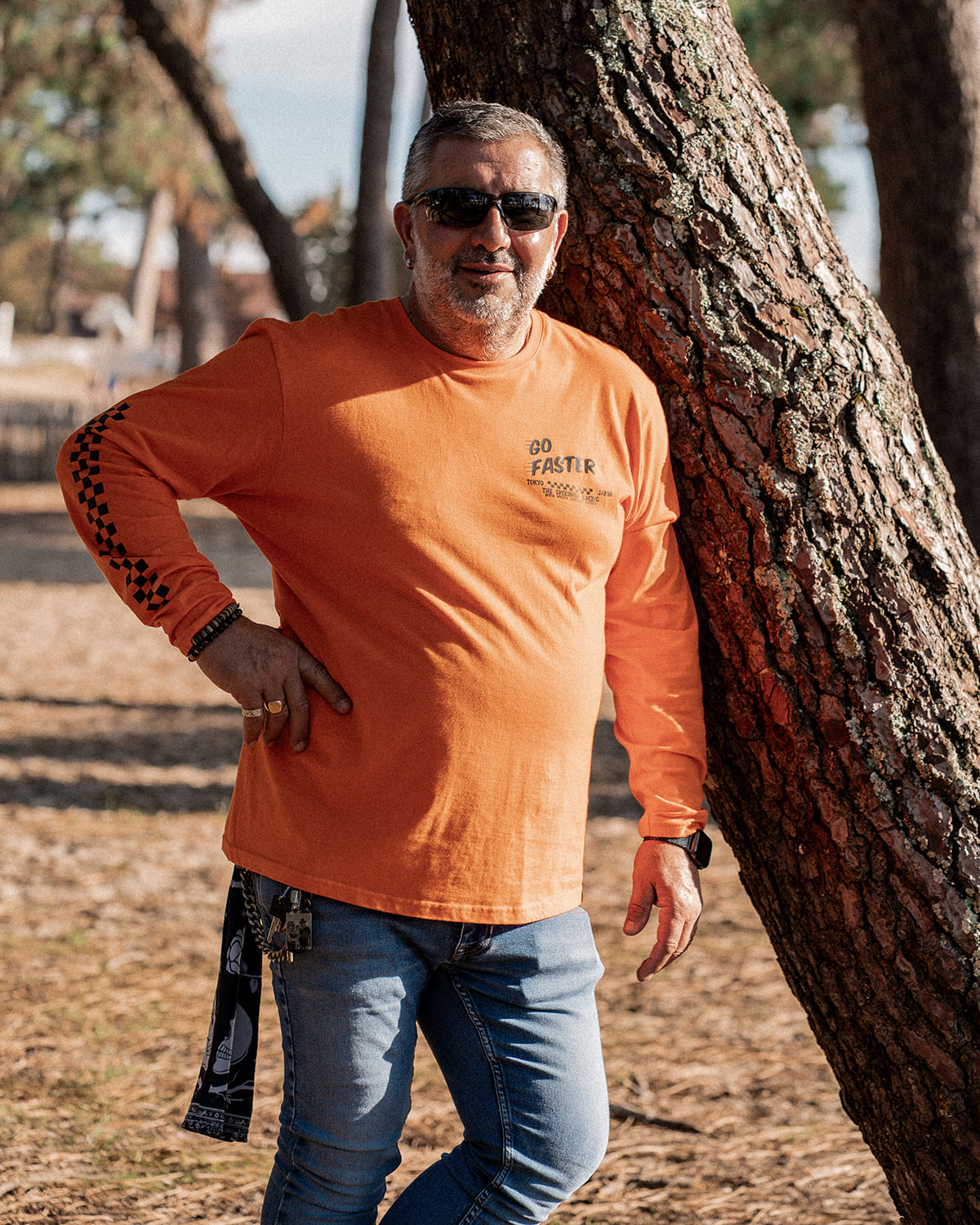 T-shirt orange "Go Faster" Motor Wheels avec visuel motard et graphisme racing style japonais