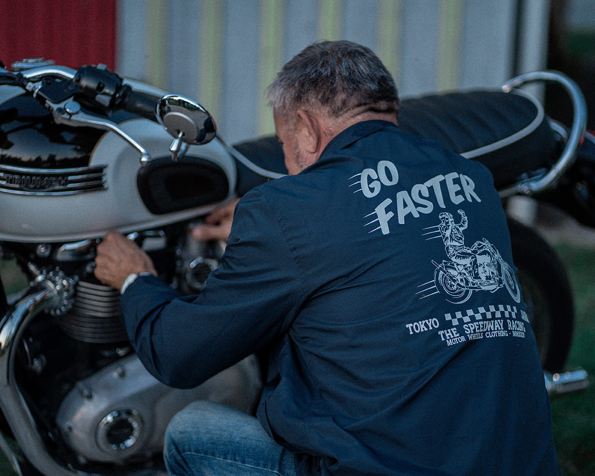Veste coach "Go Faster" Motor Wheels avec illustration motard au dos
