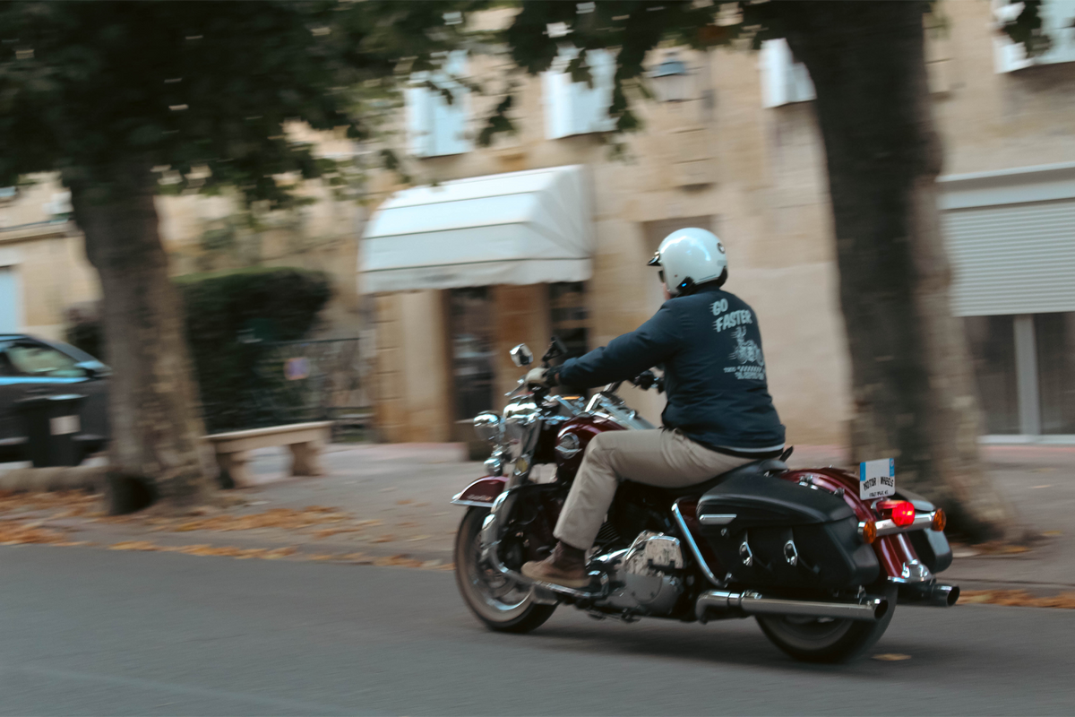 Veste coach "Go Faster" Motor Wheels avec illustration motard au dos